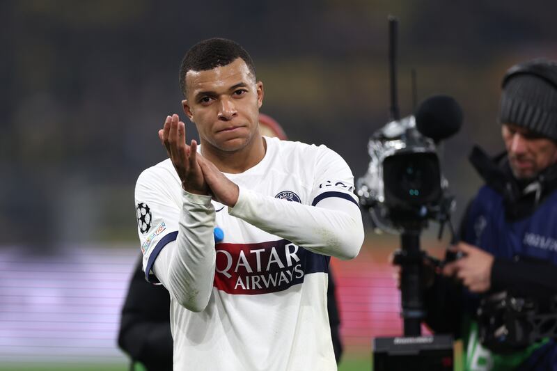 Dortmund (Germany), 13/12/2023.- PSG'Äôs Kylian Mbappe reacts after the UEFA Champions League group stage soccer match between Borussia Dortmund and Paris Saint-Germain, in Dortmund, Germany, 13 December 2023. (Liga de Campeones, Alemania, Rusia) EFE/EPA/CHRISTOPHER NEUNDORF