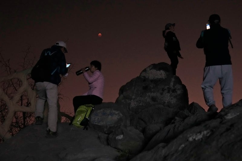 FOTO: (AP Photo/Ng Han Guan)